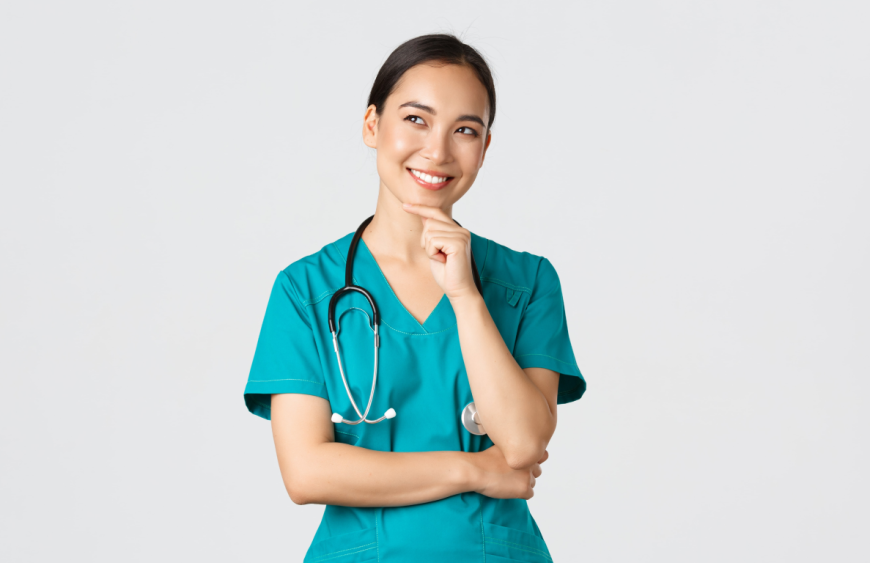 covid19-healthcare-workers-pandemic-concept-smiling-pleased-attractive-asian-female-doctor-scrubs-looking-upper-left-corner-thinking-have-idea-standing-thoughtful-white-background-min 1